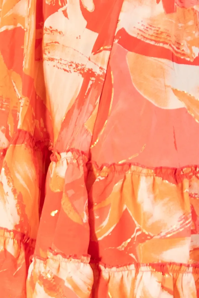 vestido-ruffles-naranja-detalle.webp