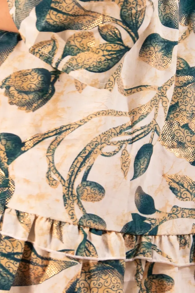 vestido-corto-volado-turquesa-detalle.webp