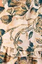 vestido-corto-volado-turquesa-detalle.webp